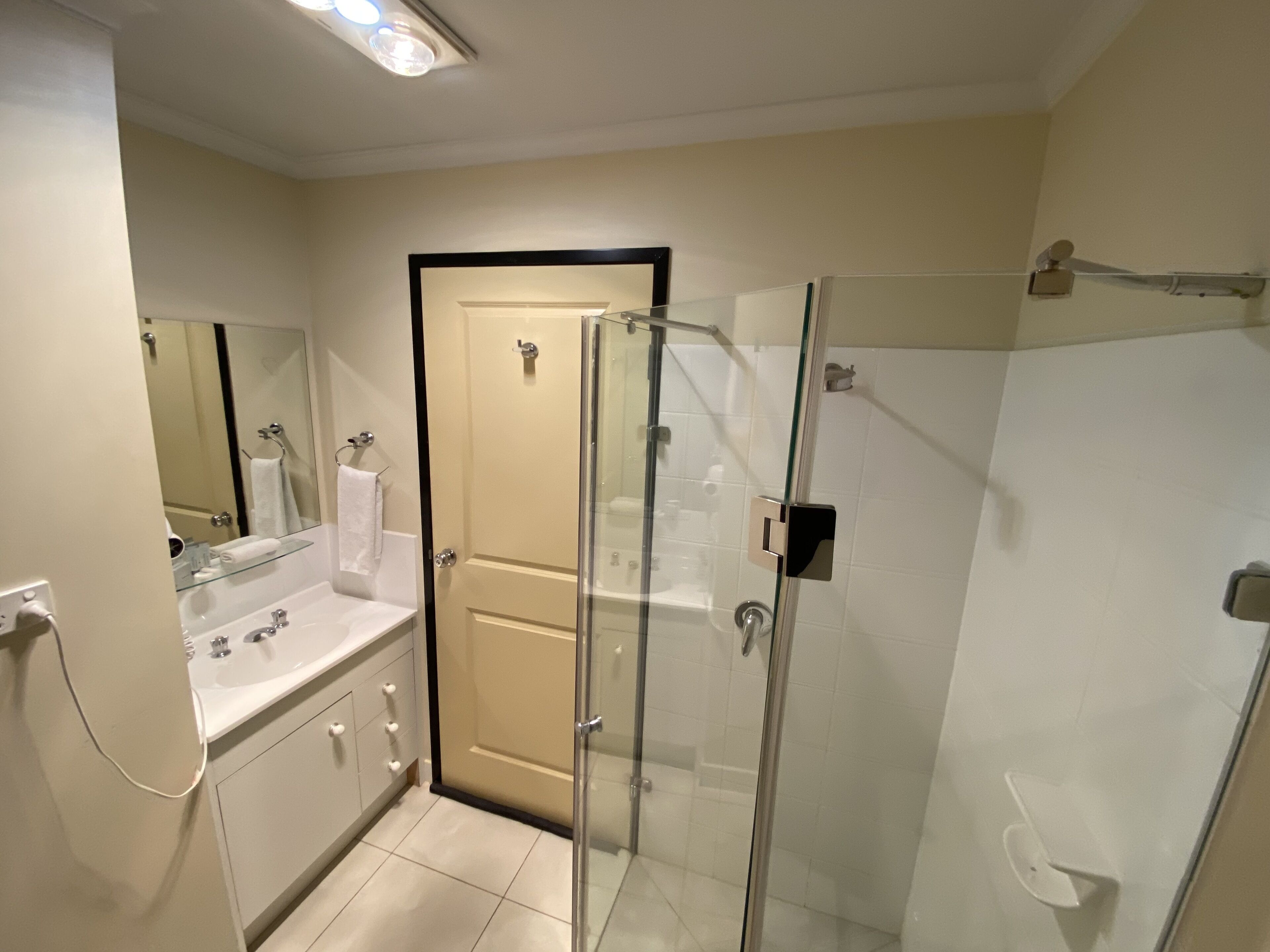 Twin Queen | Bathroom | Shower, rainfall showerhead, towels