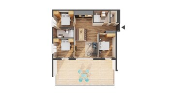 A floor plan of a hotel room with a bed, a desk, a chair, a sofa, and a small kitchen area.