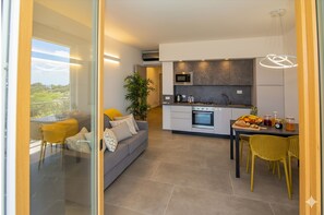 Apartment, 1 Schlafzimmer | Eigene Küche | Kühlschrank, Ofen, Herdplatte, Kochgeschirr/Geschirr/Besteck