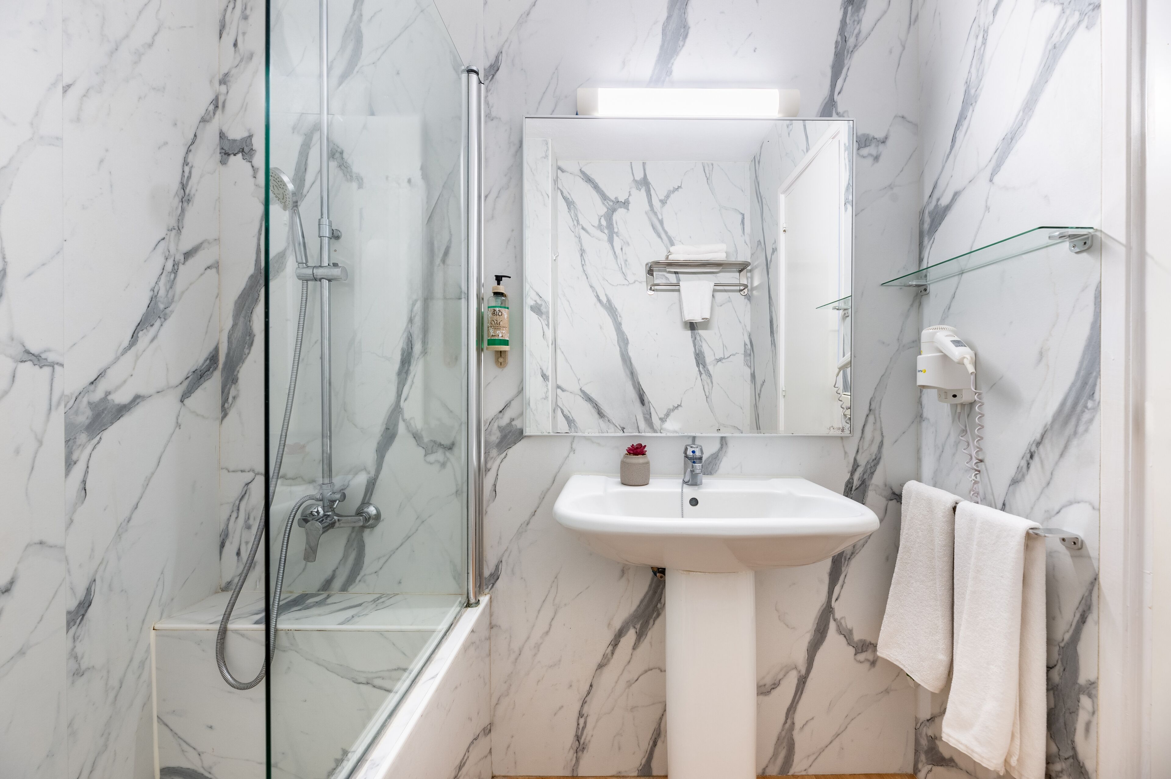 Combined shower/bathtub, hair dryer