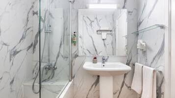 Combined shower/bathtub, hair dryer