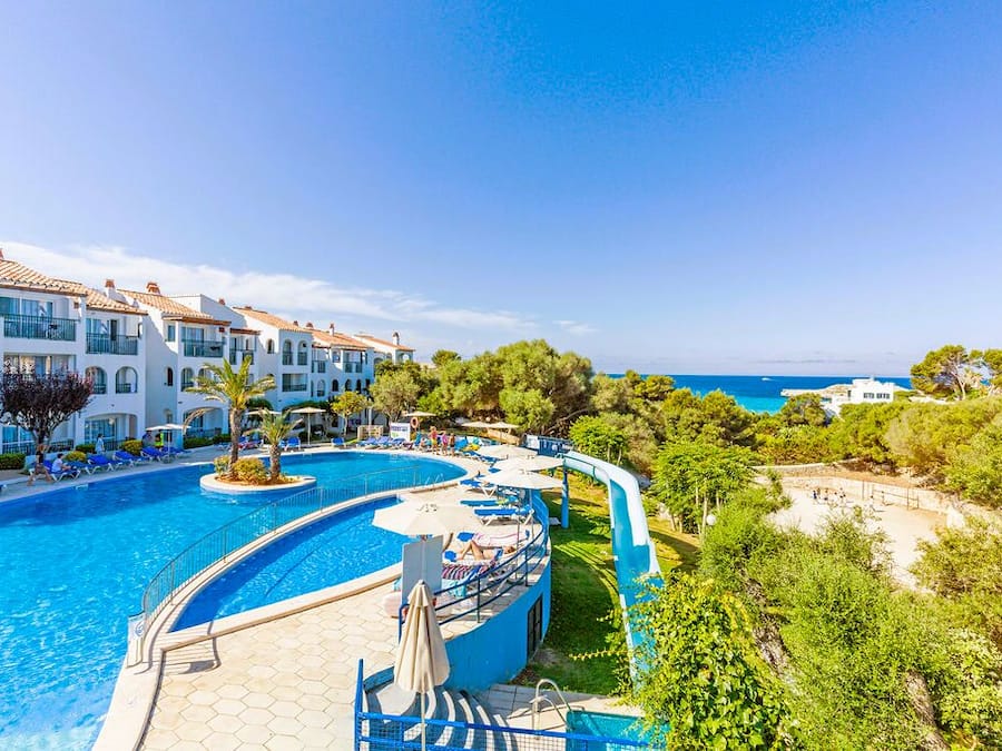 Seasonal outdoor pool, open 3:00 PM to 7:00 PM, pool umbrellas