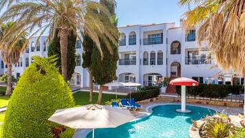 Seasonal outdoor pool, open 3:00 PM to 7:00 PM, pool umbrellas