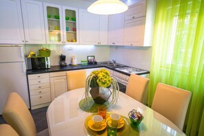 Fridge, microwave, oven, stovetop - Apartments Sunny Garden- Two Bedroom Apartment with Balcony and Garden View A4+2 (Brodarica)