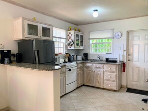 Fridge, microwave, oven, stovetop - Ajoupa 4. Comfortable clean and convenient self-catering villa west coast  (Fitts Village)