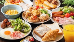 A variety of breakfast dishes including eggs, sausages, and toast. - APA Hotel Ueno Ekimae (Tokyo)