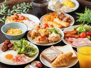 A variety of breakfast dishes including eggs, sausages, and toast. - APA Hotel Ueno Ekimae (Tokyo)