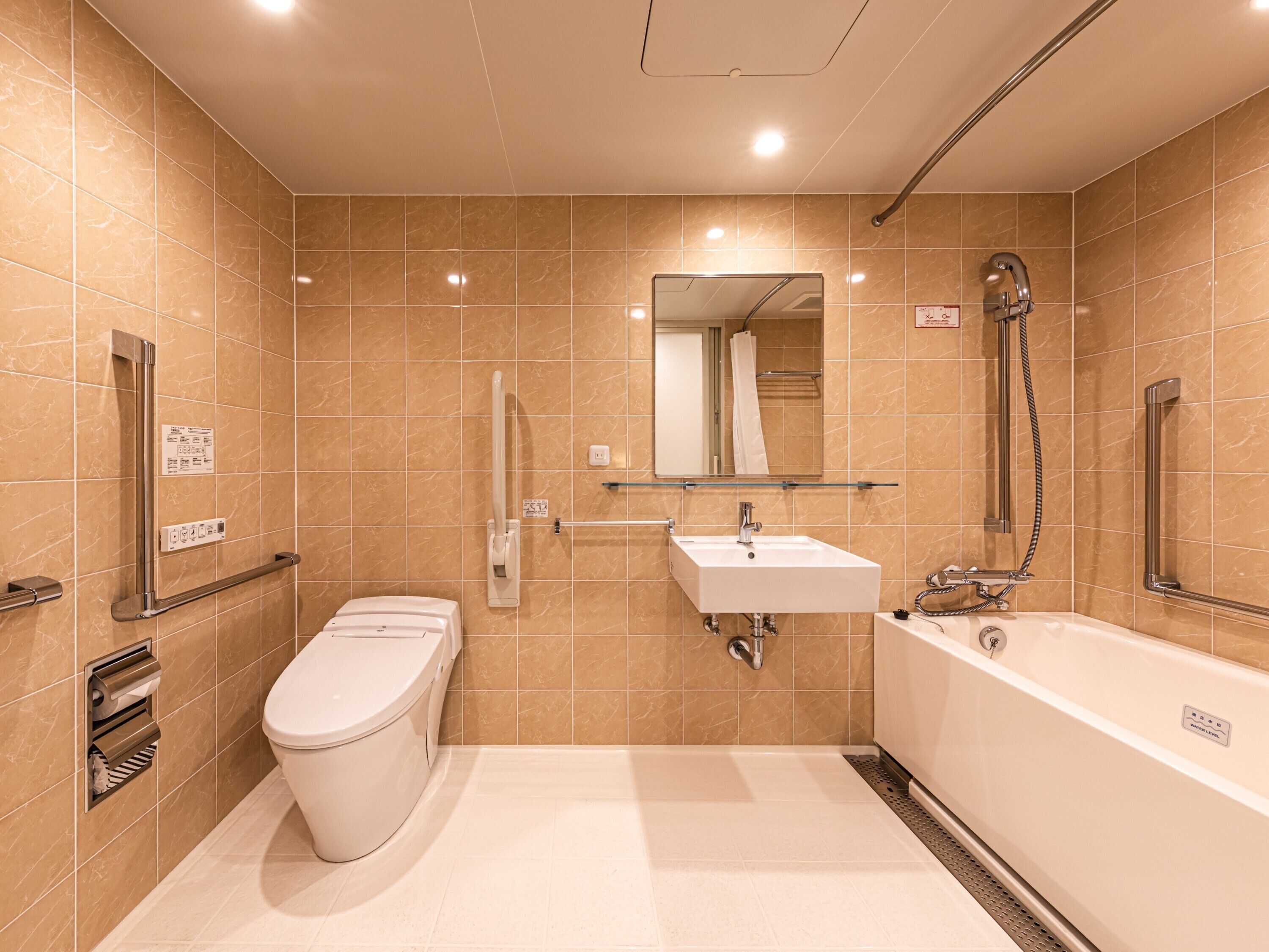 twin room, accessible, non smoking | bathroom | combined shower/bathtub, free toiletries, hair dryer, slippers