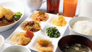 A variety of dishes including noodles, rice, and soup, served on a white plate with multiple side dishes. - APA Hotel Chibachuo Ekimae (Chiba)