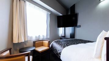 Donsdekens, een bureau, verduisterende gordijnen, gratis wifi