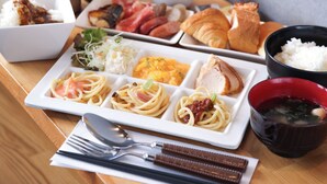 A meal with various dishes and drinks on a wooden table. - APA Hotel Hakata Ekimae 2chome (Fukuoka)
