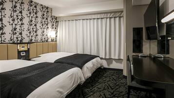 Twin Room, Non Smoking | Down comforters, desk, laptop workspace, blackout drapes