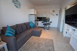 Apartment | Living room | 30-inch TV with digital channels - Luxury Wi-fi 1 Bedroom Apt. Close to El Gouna (Hurghada)