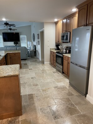 Fridge, microwave, oven, stovetop - Love Water? Gulf Access, Boat Dock, Private Heated Pool in Lanai. (Cape Coral)