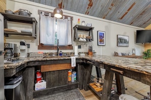 Fridge, microwave, stovetop, coffee/tea maker - Runaway Train Cabin at Fox Pass Cabins (Garland County)