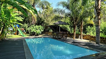 Indoor pool, outdoor pool, pool umbrellas, pool loungers