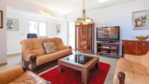 Apartment, Multiple Beds | Living room | 30-inch TV with digital channels - Apt w Jacuzzi, Balcony & sea View, 3 min to Beach (Dugi Rat)
