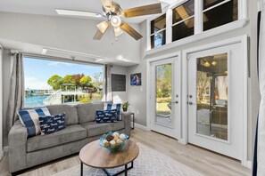 Smart TV, fireplace, books, offices