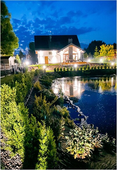 This beautifull villa is located by the wather, surrounded by forest.