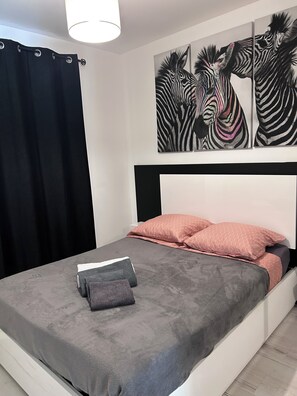 2 slaapkamers, een kluis op de kamer, een strijkplank/strijkijzer