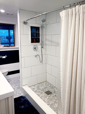 Shower, towels, soap, shampoo