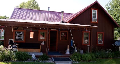 Cozy, quirky and quaint updated Farm House surrounded by Sleeping Bear Dunes.