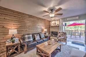 TV, fireplace, books