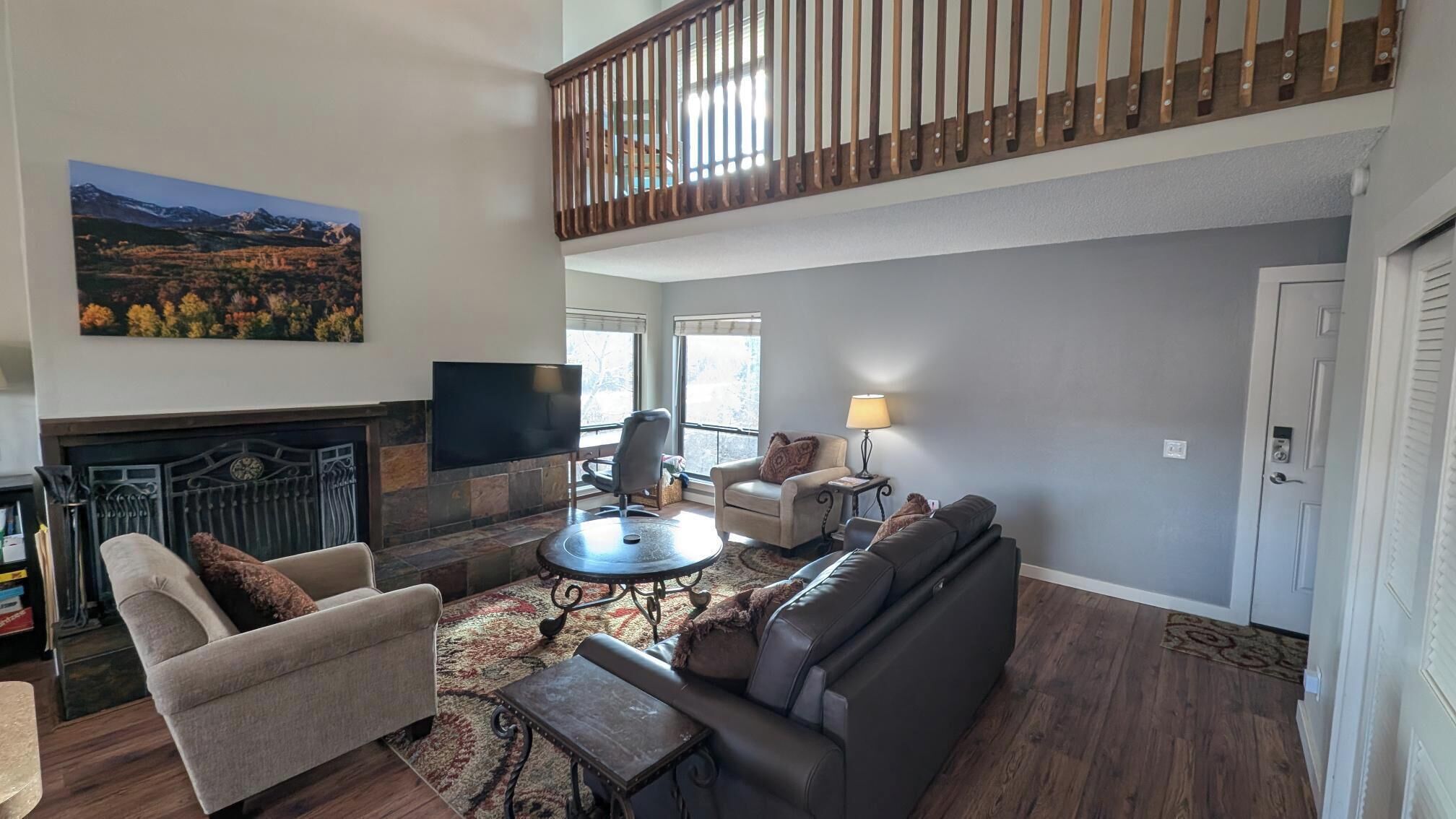 TV, fireplace, books