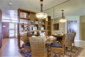 Enjoy meals in this cozy dining area with a round table and four comfortable chairs.
