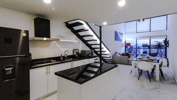 Fridge, microwave, stovetop, coffee/tea maker