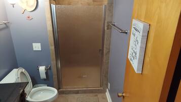 Shower, hair dryer, towels, soap