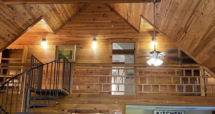 Gorgeous large waterfront log lake home with private dock!