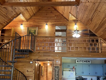 Gorgeous large waterfront log lake home with private dock!  