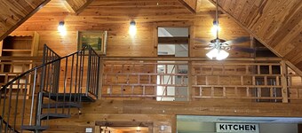 Gorgeous large waterfront log lake home with private dock!