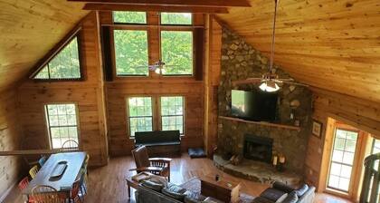 Gorgeous large waterfront log lake home with private dock!