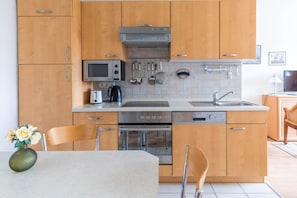 Fridge, microwave, dishwasher, coffee/tea maker