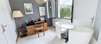 Charming Beachside Home with Enclosed Garden and Modern Amenities