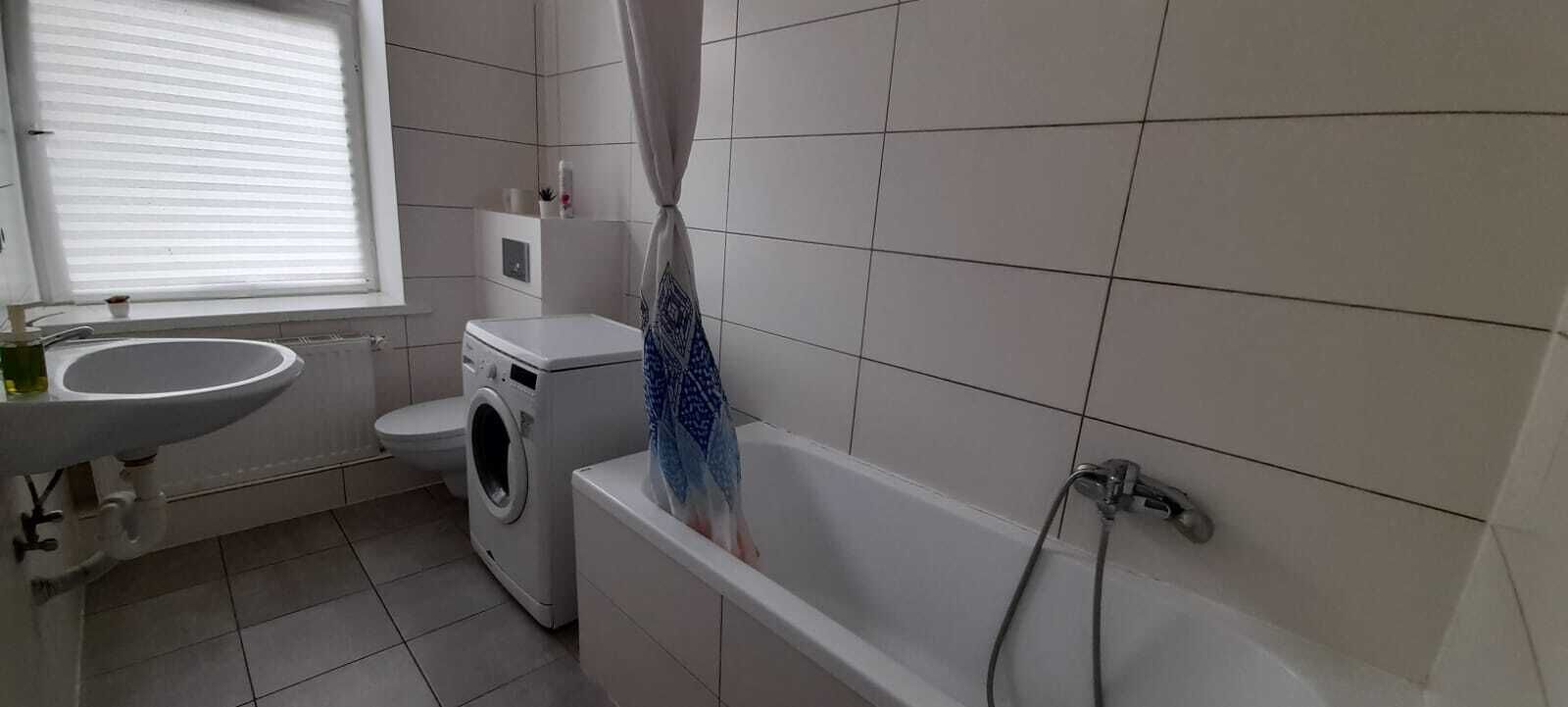 Bathtub, hair dryer, towels, soap