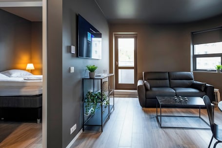 Standard Apartment, 1 Bedroom, Balcony | Living room | 55-inch Smart TV with digital channels, TV. The New Post Office