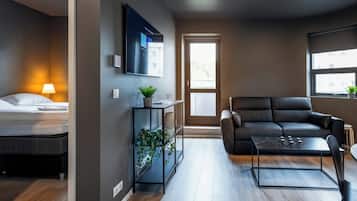 Standard-Apartment, 1 Schlafzimmer, Balkon | Wohnzimmer