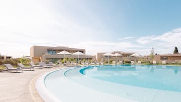 Indoor pool, outdoor pool, pool umbrellas, sun loungers