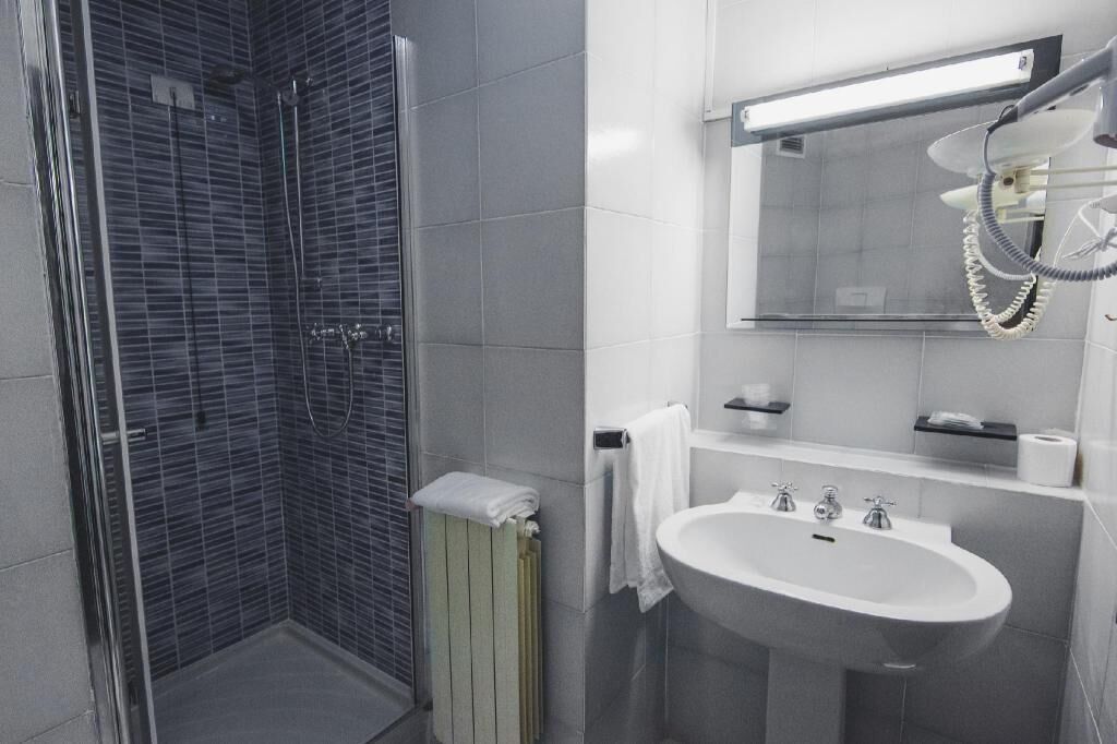 Bathroom | Shower, rainfall showerhead, hair dryer, bidet