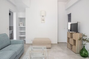 Apartment | Living area | 24-inch flat-screen TV with digital channels, TV