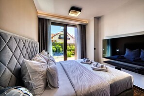 2 bedrooms, in-room safe, iron/ironing board, travel cot