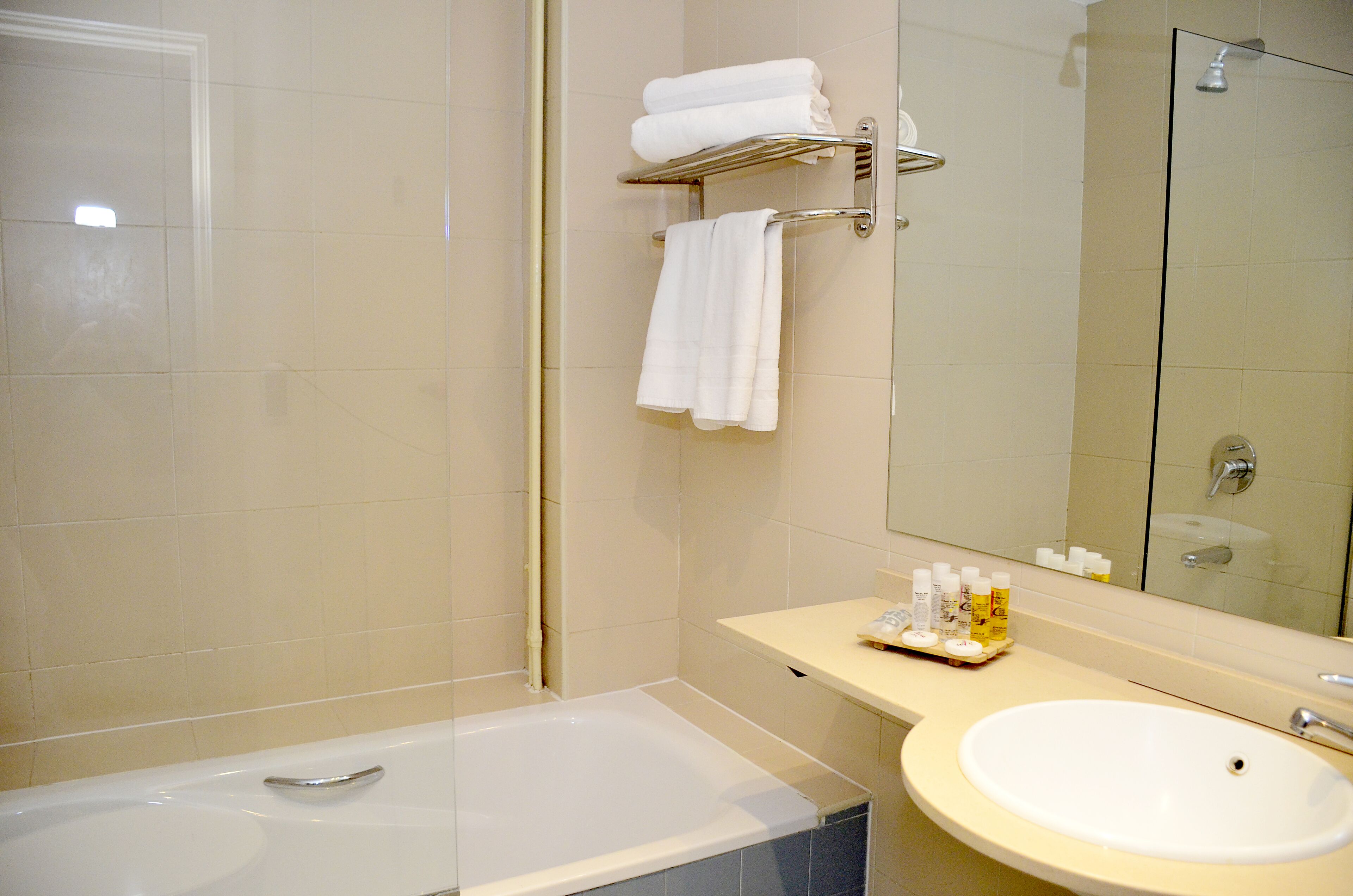 bathtub, free toiletries, hair dryer, towels