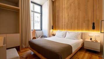 Standaard tweepersoonskamer | Een kluis op de kamer, gratis wifi, beddengoed