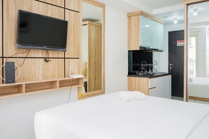 Room | Free WiFi, bed sheets - Remarkable Studio at Baileys City Apartment (South Tangerang)