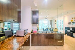Private kitchen - Luxurious 2BR Kemang Village Apartment (Jakarta)