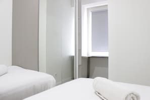 Room | 2 bedrooms, bed sheets - Chic and Comfy 2BR Apartment at Parahyangan Residence near UNPAR (Bandung)