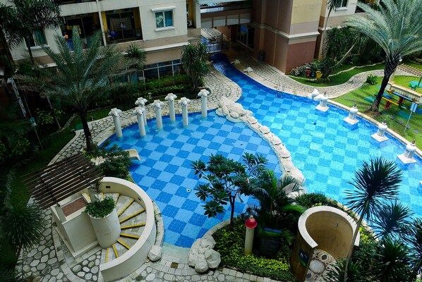 Outdoor pool - New Furnished 2BR at City Home MOI Apartment (Jakarta)